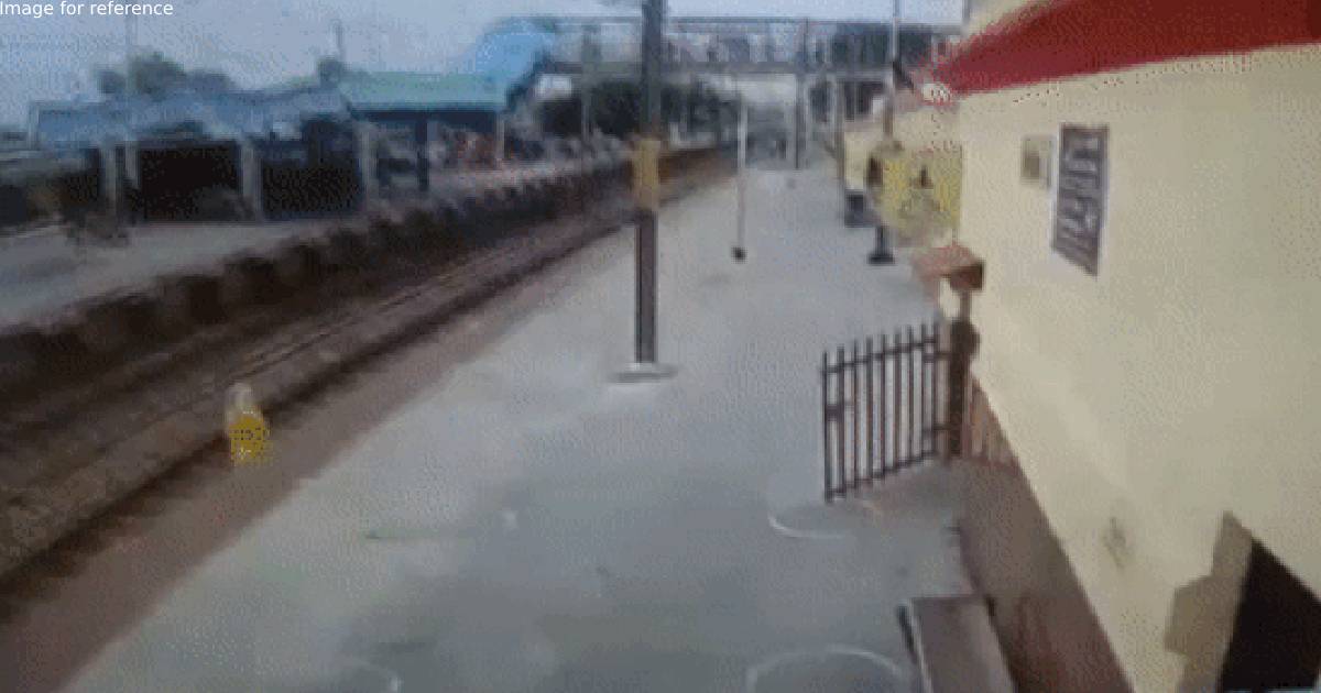UP: Woman crossing tracks saved just in time by railway official in Firozabad